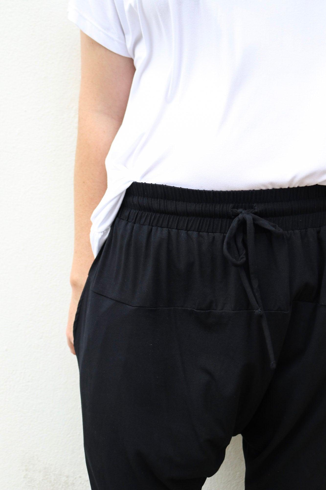 front on view of black pants with a tie up drawstring